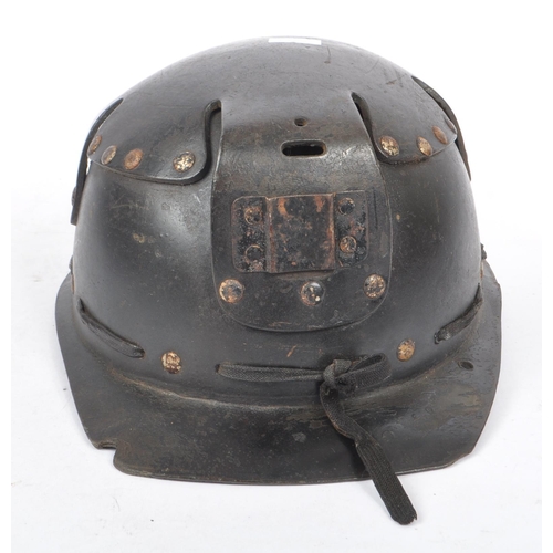 282 - A mid Century vintage leather coal miners safety helmet with number 145 etched into the underneath o... 