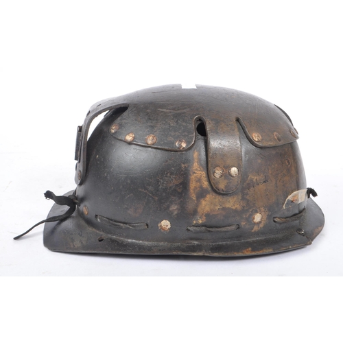 282 - A mid Century vintage leather coal miners safety helmet with number 145 etched into the underneath o... 