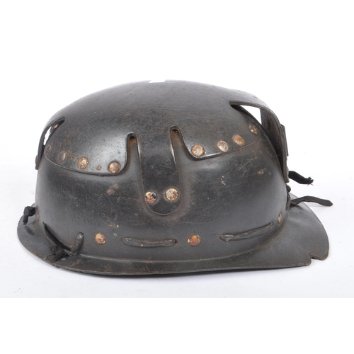 282 - A mid Century vintage leather coal miners safety helmet with number 145 etched into the underneath o... 