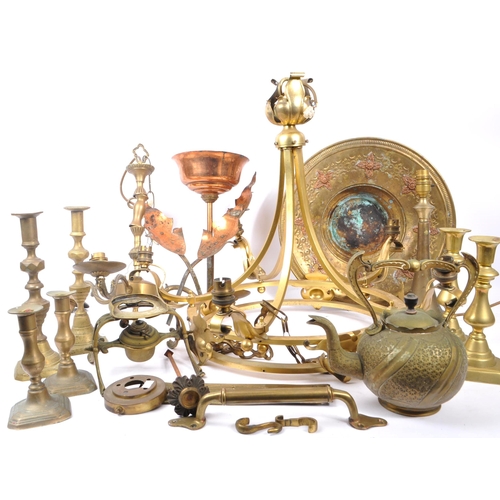 285 - A collection of brass and copper items to include a decorative spirit kettle on stand, six candlesti... 