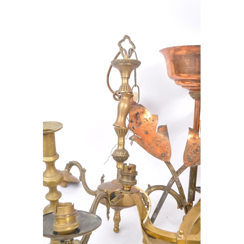 285 - A collection of brass and copper items to include a decorative spirit kettle on stand, six candlesti... 