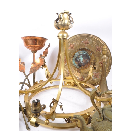 285 - A collection of brass and copper items to include a decorative spirit kettle on stand, six candlesti... 