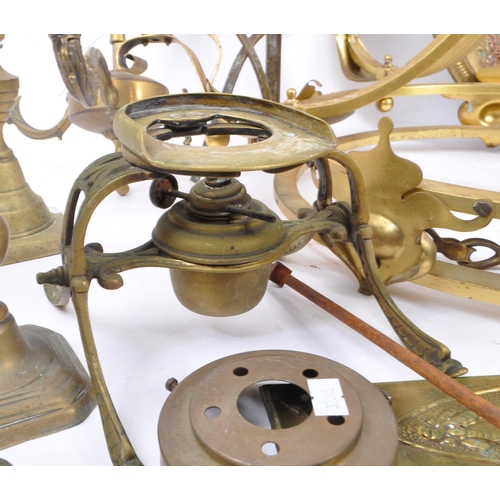 285 - A collection of brass and copper items to include a decorative spirit kettle on stand, six candlesti... 