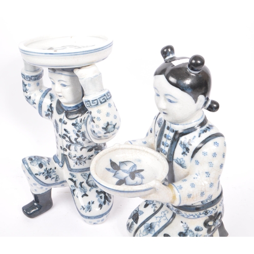 29 - Two oriental early 20th Century 1920s Chinese porcelain figures holding bowls, one female in traditi... 