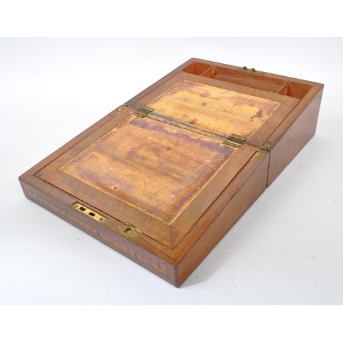 293 - A 19th century Victorian mahogany writing slope. The writing slope featuring marquetry inlaid border... 