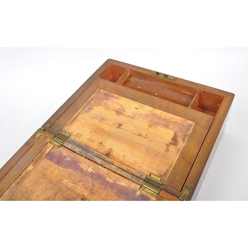 293 - A 19th century Victorian mahogany writing slope. The writing slope featuring marquetry inlaid border... 