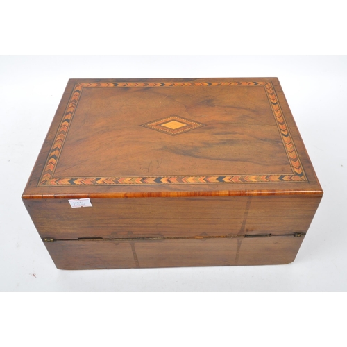 293 - A 19th century Victorian mahogany writing slope. The writing slope featuring marquetry inlaid border... 