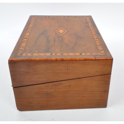 293 - A 19th century Victorian mahogany writing slope. The writing slope featuring marquetry inlaid border... 