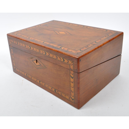 293 - A 19th century Victorian mahogany writing slope. The writing slope featuring marquetry inlaid border... 