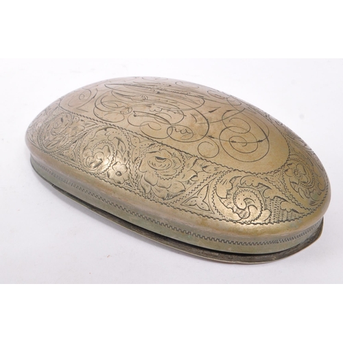 294 - A 19th century 1898 Victorian metal snuff box. The snuff box of oval curved form, with engraving ove... 