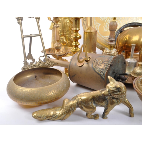 296 - A collection of brass items to include a John Linwood roasting spit jack, candlesticks, bowls, a lar... 