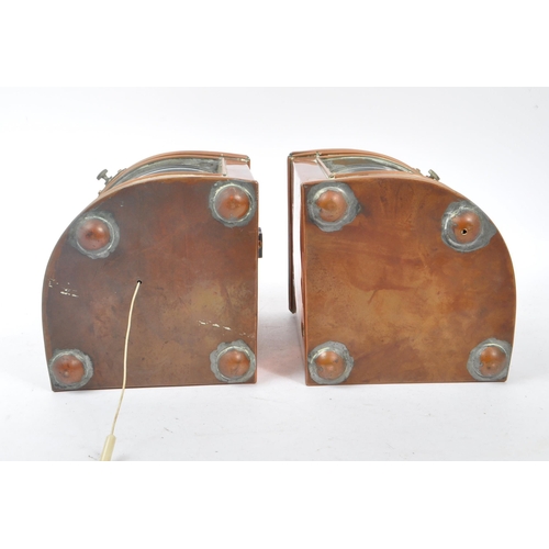 309 - A pair of early 20th century copper and brass ships port and starboard navigation lamps. The lamps o... 