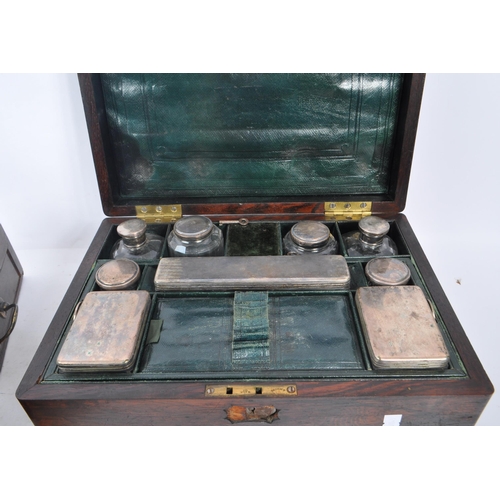 311 - A late 19th century Victorian mahogany writing slope and vanity box. The vanity box having an appoin... 