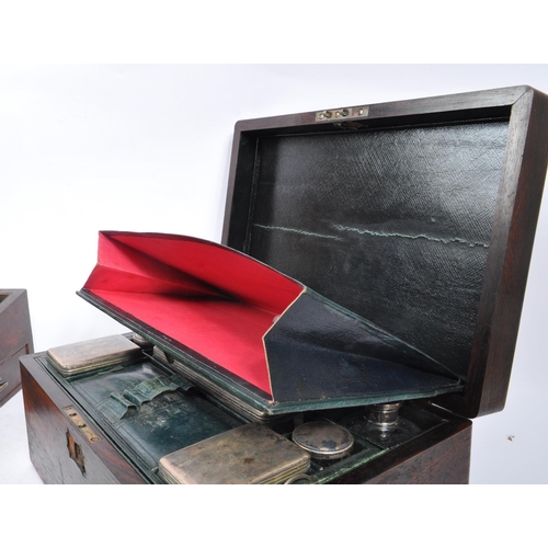 311 - A late 19th century Victorian mahogany writing slope and vanity box. The vanity box having an appoin... 