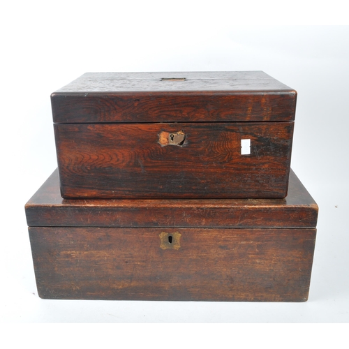 311 - A late 19th century Victorian mahogany writing slope and vanity box. The vanity box having an appoin... 