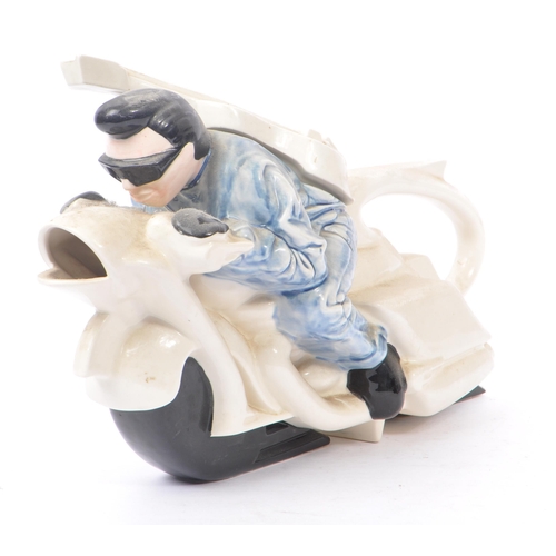 32 - A Silver Crane ‘Rocker on a Motorbike’ novelty teapot designed by Les Rayner and often referred to a... 