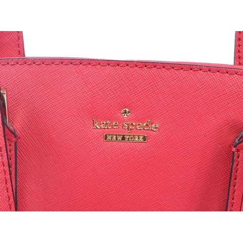 320 - Kate Spade - New York - A contemporary luxury designer handbag. Rosso pattern Lottie dual flat carry... 