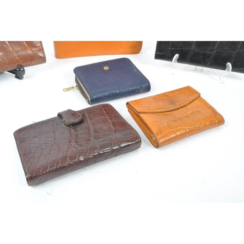 325 - Mulberry - London - A collection of leather luxury designer purse / wallets. Together with a pocket ... 