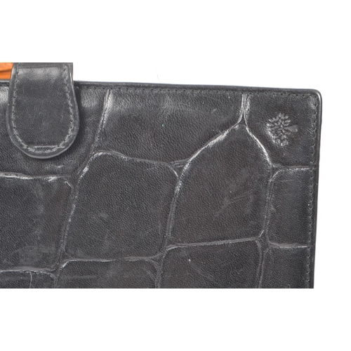 325 - Mulberry - London - A collection of leather luxury designer purse / wallets. Together with a pocket ... 