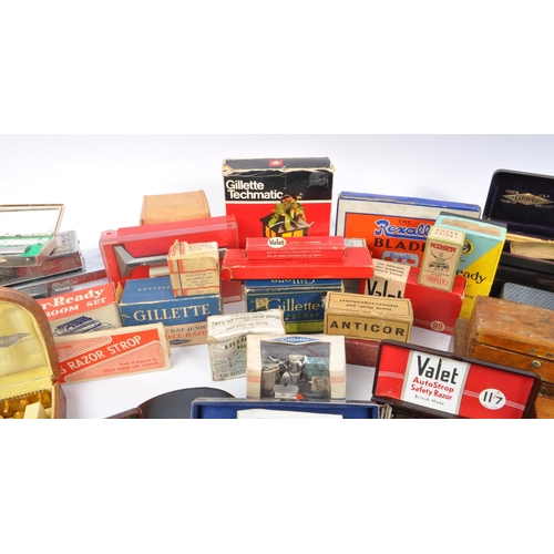 326 - A large collection of vintage 20th Century razors to include miniatures and cut throats. Comprising ... 