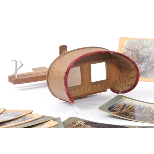 337 - A vintage 20th Century circa. 1970s Stereoscope viewer accompanied by a collection of slides depicti... 