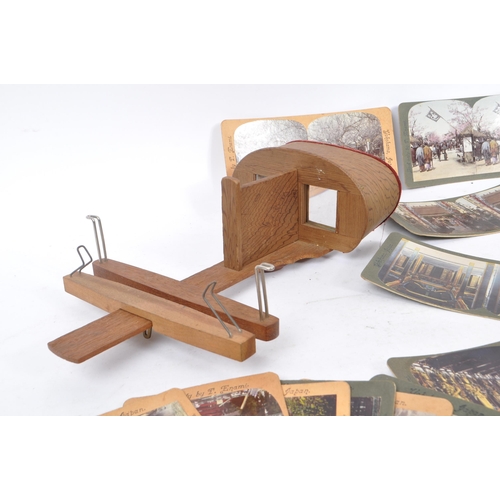 337 - A vintage 20th Century circa. 1970s Stereoscope viewer accompanied by a collection of slides depicti... 