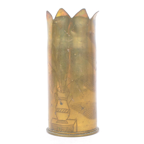 339 - An early 20th Century First World War brass trench art vase from artillery shell, engraved with leaf... 