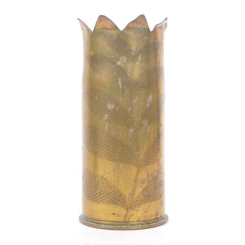 339 - An early 20th Century First World War brass trench art vase from artillery shell, engraved with leaf... 