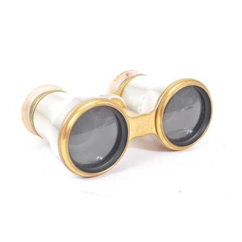 342 - An early 20th century circa 1920s mother of pearl pair of theatre / opera binoculars. Together with ... 