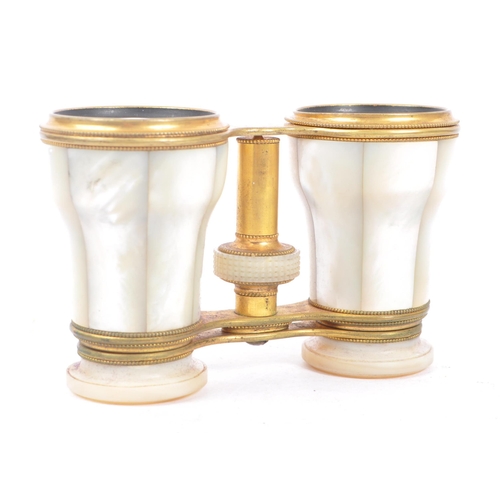 342 - An early 20th century circa 1920s mother of pearl pair of theatre / opera binoculars. Together with ... 