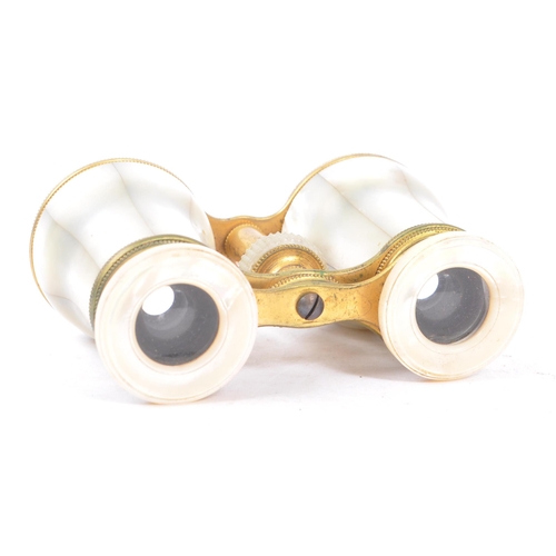 342 - An early 20th century circa 1920s mother of pearl pair of theatre / opera binoculars. Together with ... 