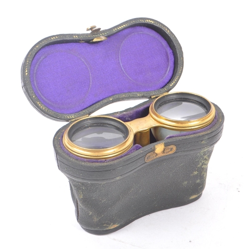 342 - An early 20th century circa 1920s mother of pearl pair of theatre / opera binoculars. Together with ... 