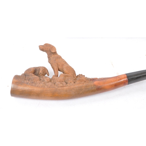 349 - A collection of vintage 19th century and 20th century smoking pipes to include carved wooden example... 