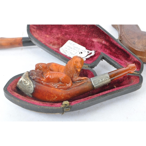 349 - A collection of vintage 19th century and 20th century smoking pipes to include carved wooden example... 