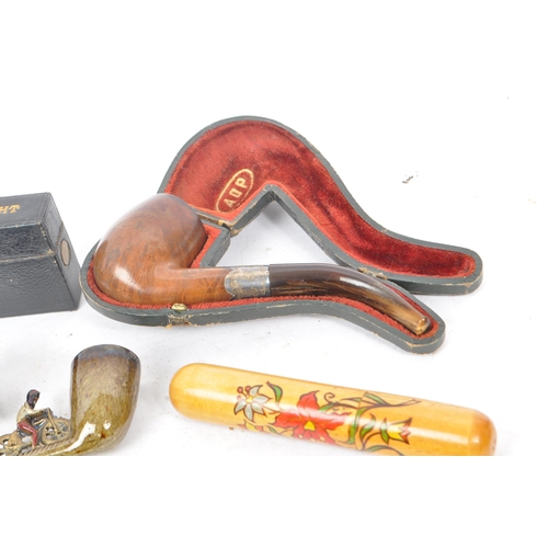 349 - A collection of vintage 19th century and 20th century smoking pipes to include carved wooden example... 