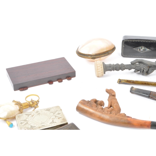 349 - A collection of vintage 19th century and 20th century smoking pipes to include carved wooden example... 