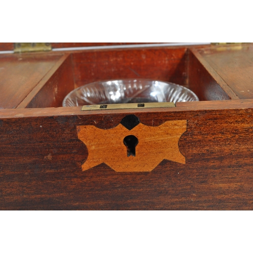 354 - A George III mahogany inlaid tea caddy box. With inlaid decoration to top, hinged lid revealing cut ... 