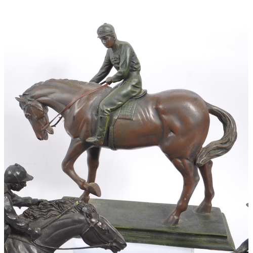 355 - A collection of 20th Century nine bronze effect figures of jockeys and racing horses upon various pl... 