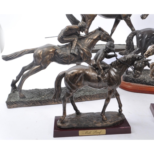 355 - A collection of 20th Century nine bronze effect figures of jockeys and racing horses upon various pl... 