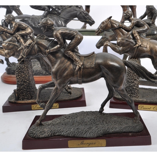 355 - A collection of 20th Century nine bronze effect figures of jockeys and racing horses upon various pl... 