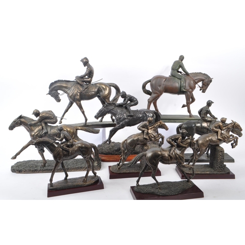 355 - A collection of 20th Century nine bronze effect figures of jockeys and racing horses upon various pl... 