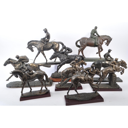 355 - A collection of 20th Century nine bronze effect figures of jockeys and racing horses upon various pl... 