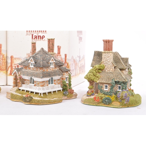 358 - Lilliput Lane - A collection of late 20th century house / cottage resin figurines / ornaments. To in... 