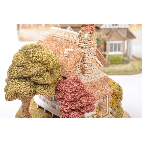 358 - Lilliput Lane - A collection of late 20th century house / cottage resin figurines / ornaments. To in... 