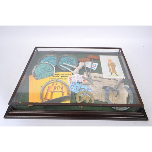 359 - Equestrian Interest - A vintage 20th Century glass and wooden display case displaying collection of ... 