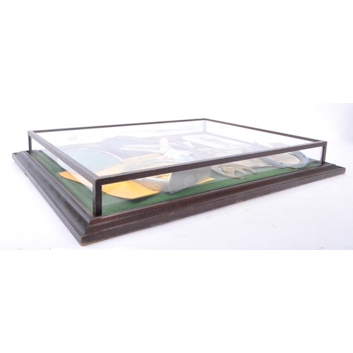 359 - Equestrian Interest - A vintage 20th Century glass and wooden display case displaying collection of ... 