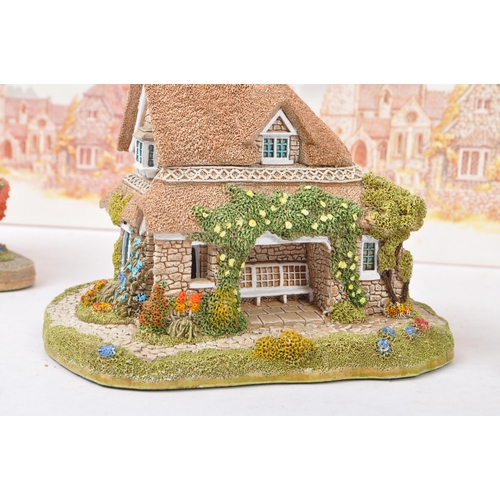 360 - Lilliput Lane - A collection of late 20th century house / cottage resin figurines / ornaments. To in... 