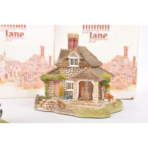 360 - Lilliput Lane - A collection of late 20th century house / cottage resin figurines / ornaments. To in... 