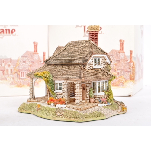 360 - Lilliput Lane - A collection of late 20th century house / cottage resin figurines / ornaments. To in... 