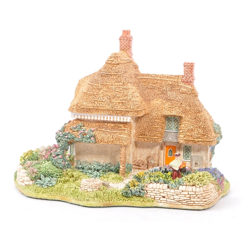 361 - Lilliput Lane - A collection of late 20th century house / cottage resin figurines / ornaments. To in... 